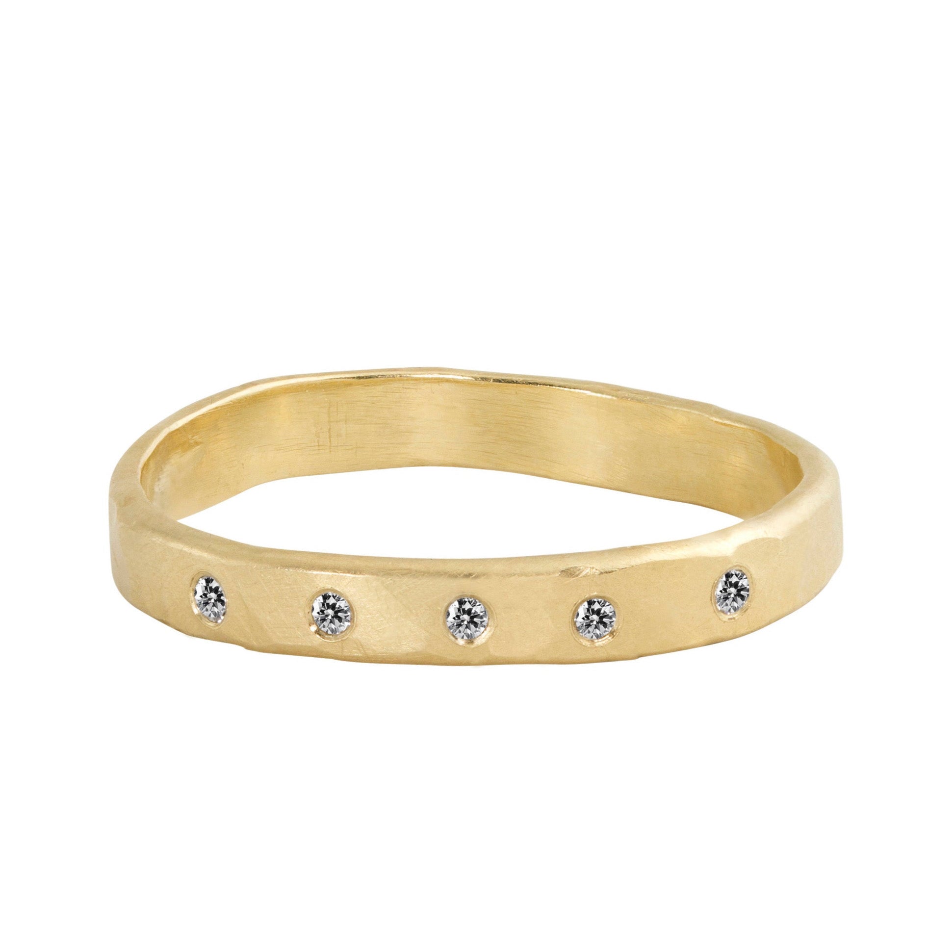14k yellow gold stackable hammered ring with small white diamonds on a white background
