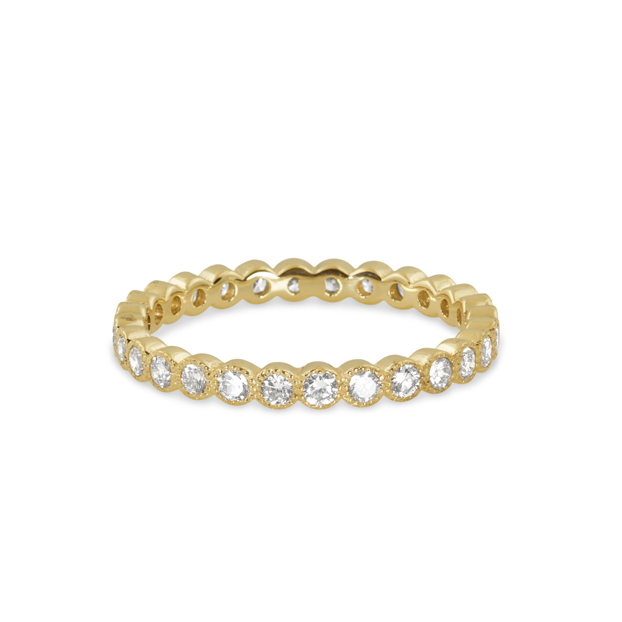 14k yellow gold milgrain white diamond eternity stacking ring on a white background