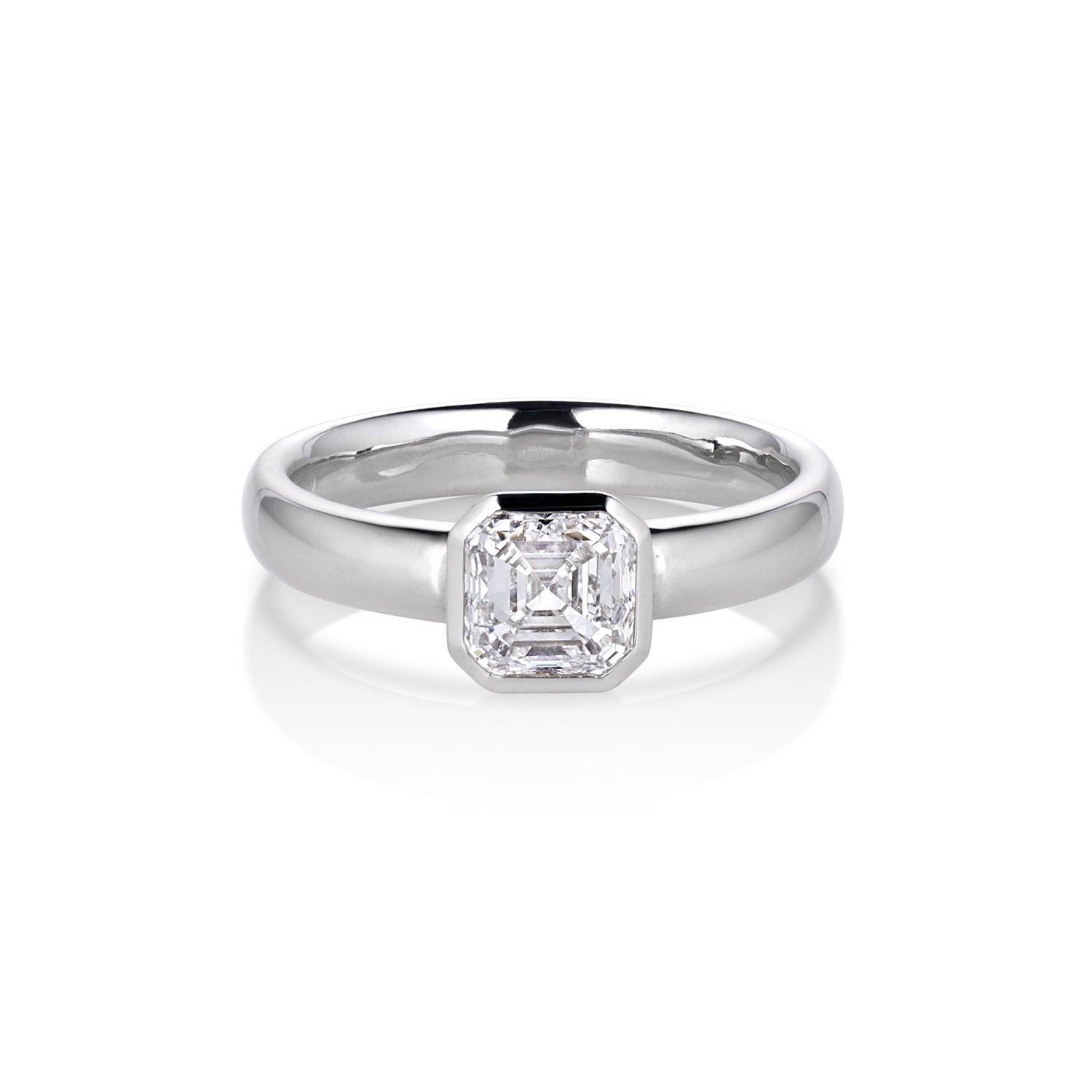 Ascher Cut white diamond single stone solitaire engagement ring in white gold on comfort fit band on white background 