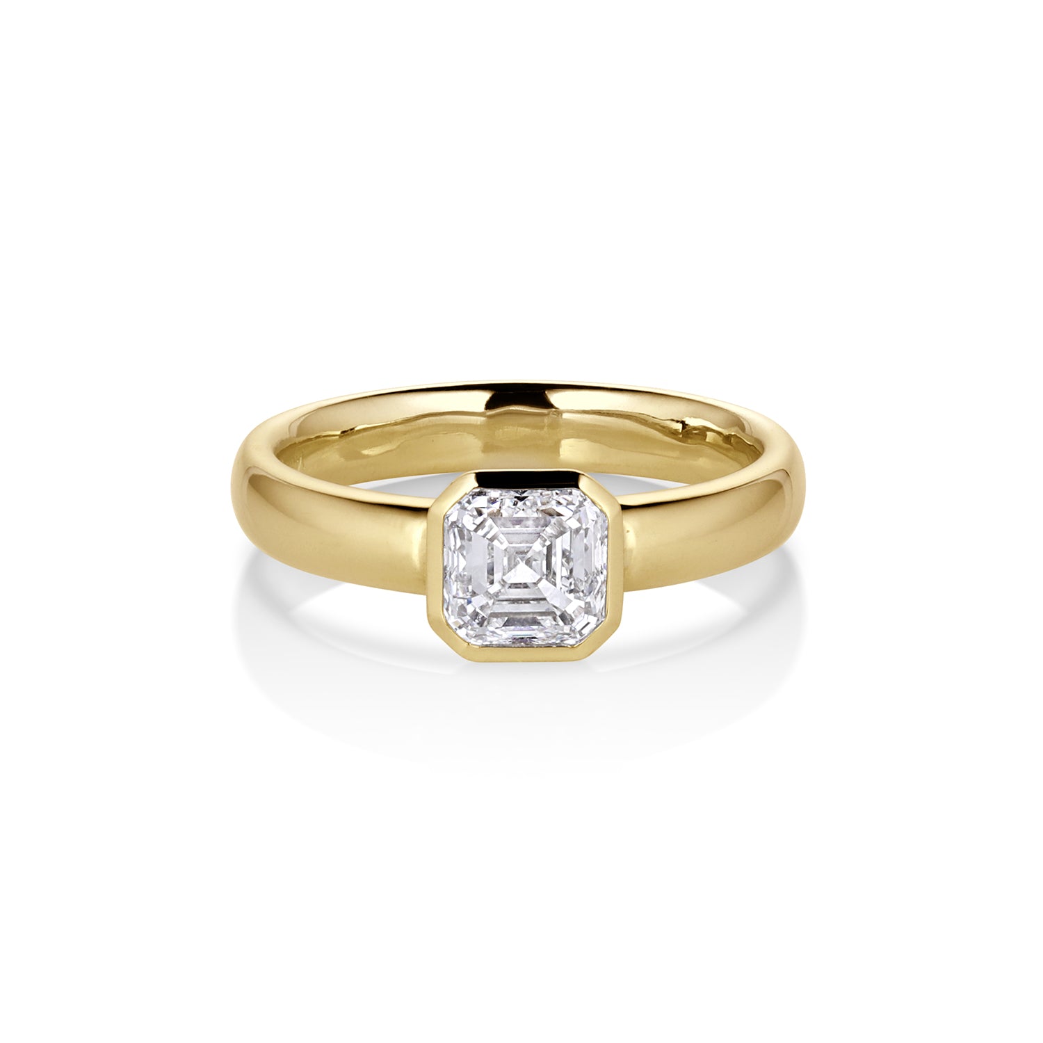 Ascher Cut white diamond single stone solitaire engagement ring in 14k yellow gold on comfort fit band on white background  