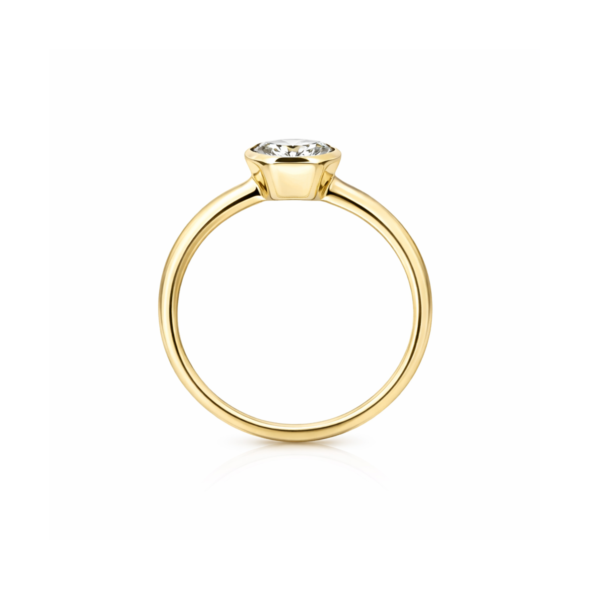 Yellow gold bezel set solitaire ring with a round white diamond tapered band with high polish shown side view ona white background