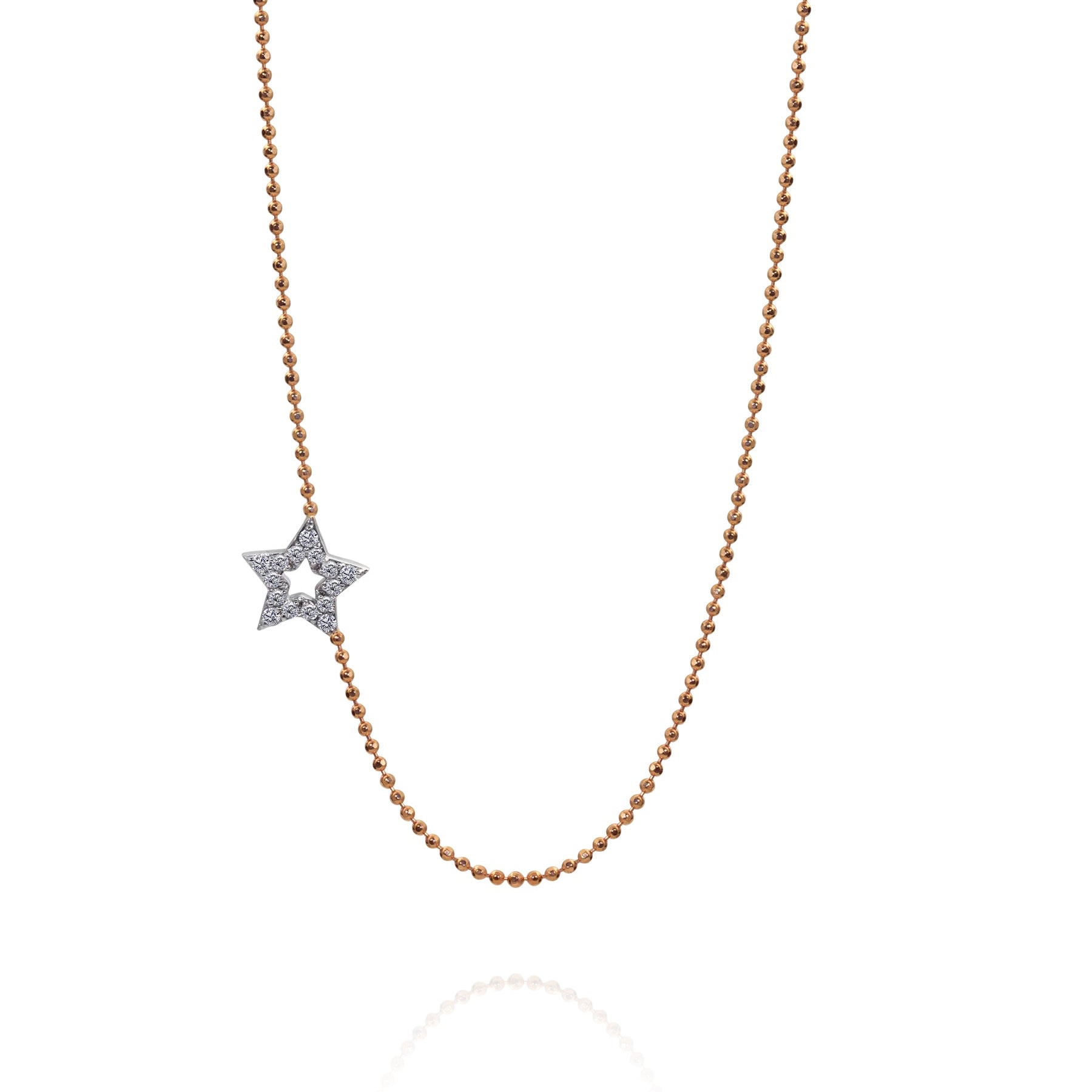 14k rose gold diamond cut ball chain necklace with an integrated offset star-shaped pave white diamond pendant shown on a white background
