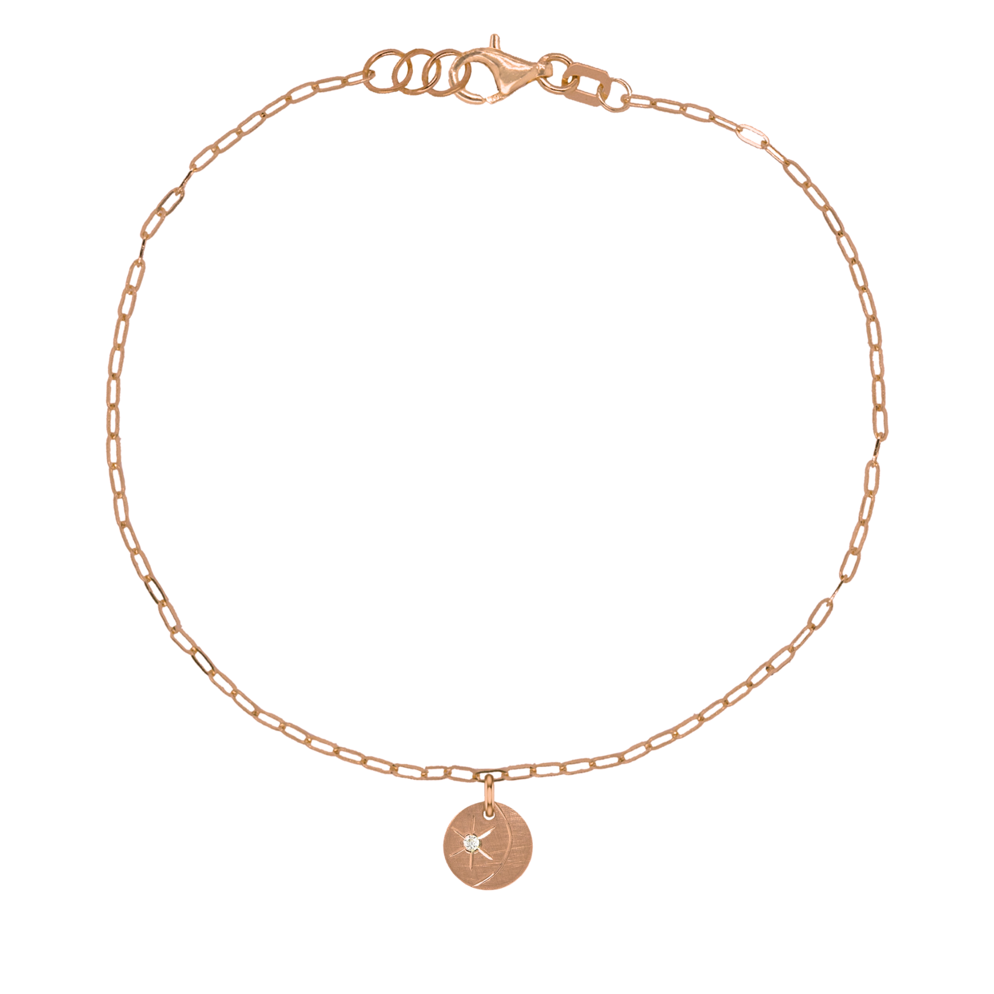 14k rose gold teeny tiny disc charm with hand etched moon and white diamond starburst on paperclip link chain on white background