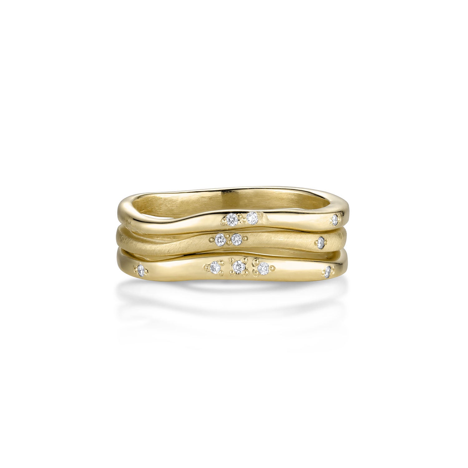 Stack of three 14k gold wavy rings with embedded diamonds. polished and satin texture shown on a white background