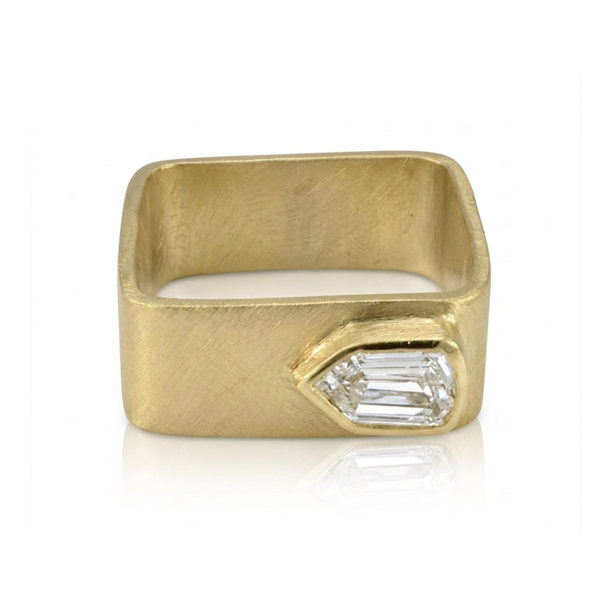 Wide band geometric shield cut diamond bezel solitaire ring in 14k yellow gold, front profile view on a white background