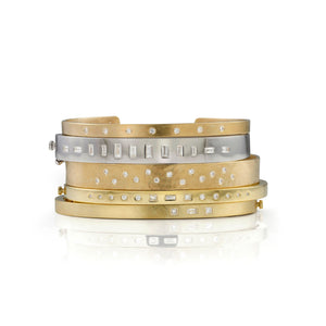 14k yellow gold SIMI cuff bracelet with scattered diamonds stacked with metro cuff bracelets