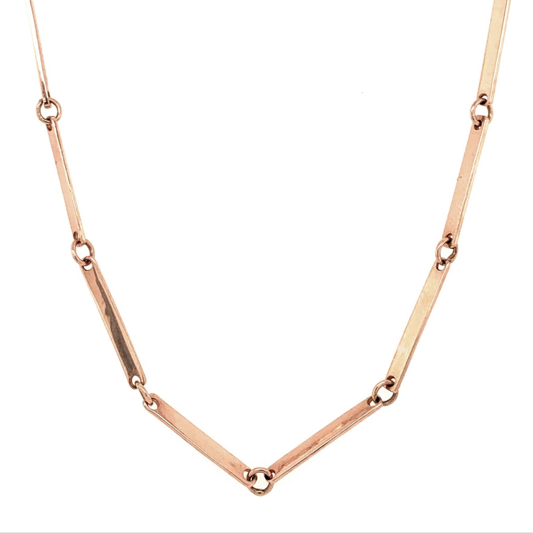 Handmade 14k Gold Chain in rose gold on white background.
