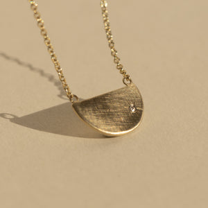 14k gold GORY half circle necklace is studio