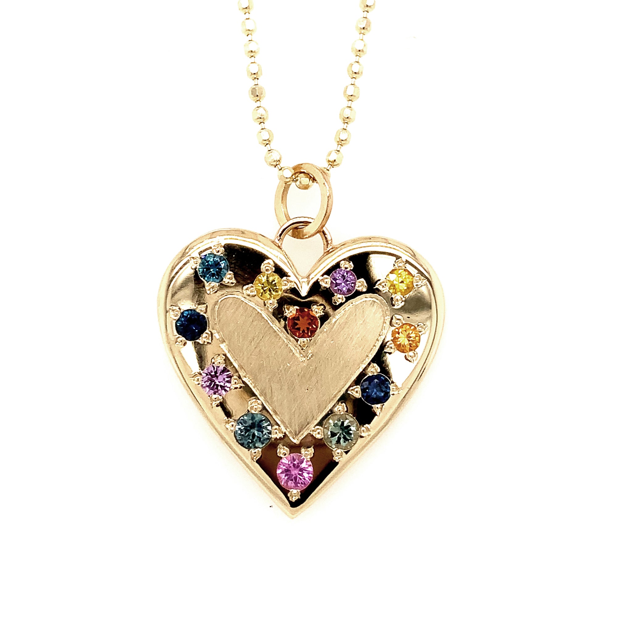 14k yellow gold large heart pendant of complimenting shiny and satin finish with outer edge of mixed color sapphires