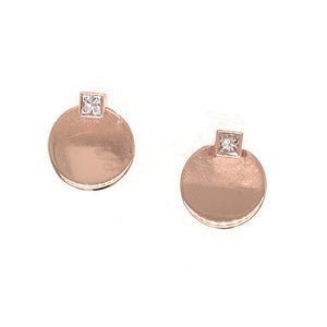 14k rose gold circle post earrings with complimenting satin and shiny finish and princess cut white diamond