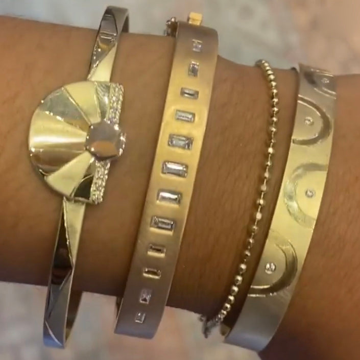 14k JORU bracelet layered with metro hinged cuff and JORI bracelet