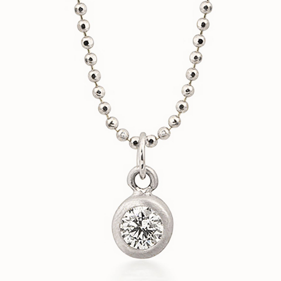 14k white gold OTTO diamond pendant in bezel setting