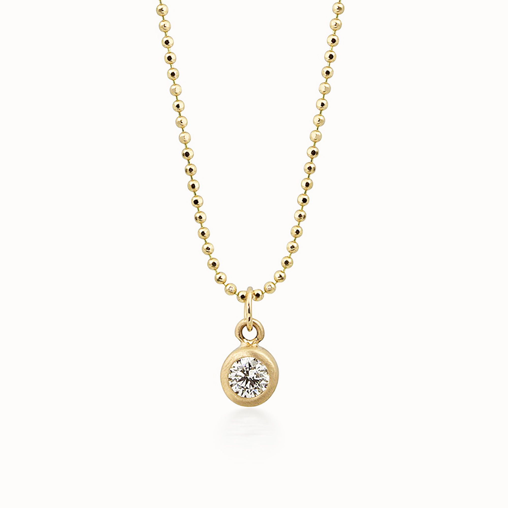 14k white gold OTTO diamond pendant in bezel setting