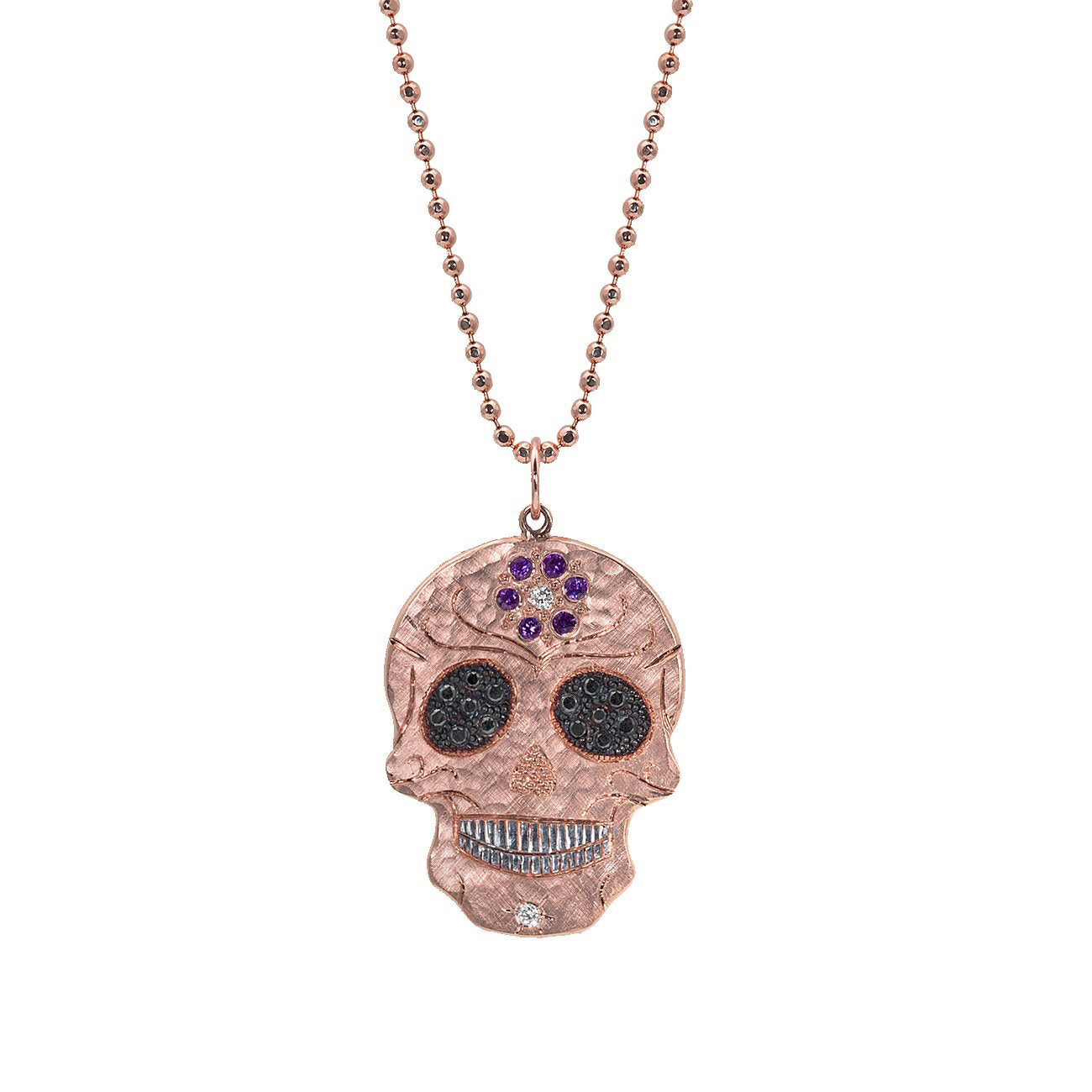 14k rose gold small SKOR ghostrider pendant with black diamond eyes and sapphire flower