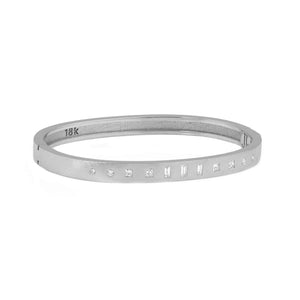 18k white gold TUMI hinged cuff bracelet with mixed white diamonds