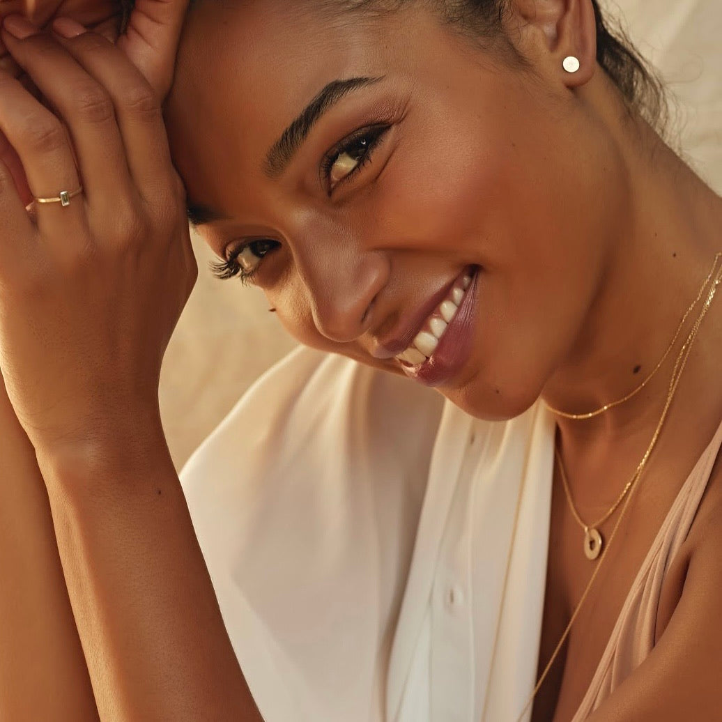 14k gold GELP baguette stacker ring on model