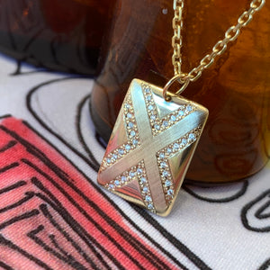 14k gold CAXX pendant with diamond "x"