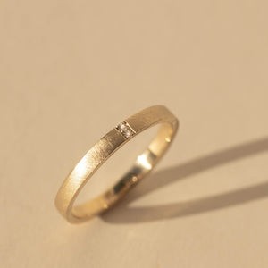 14k gold GELB stacker ring in studio