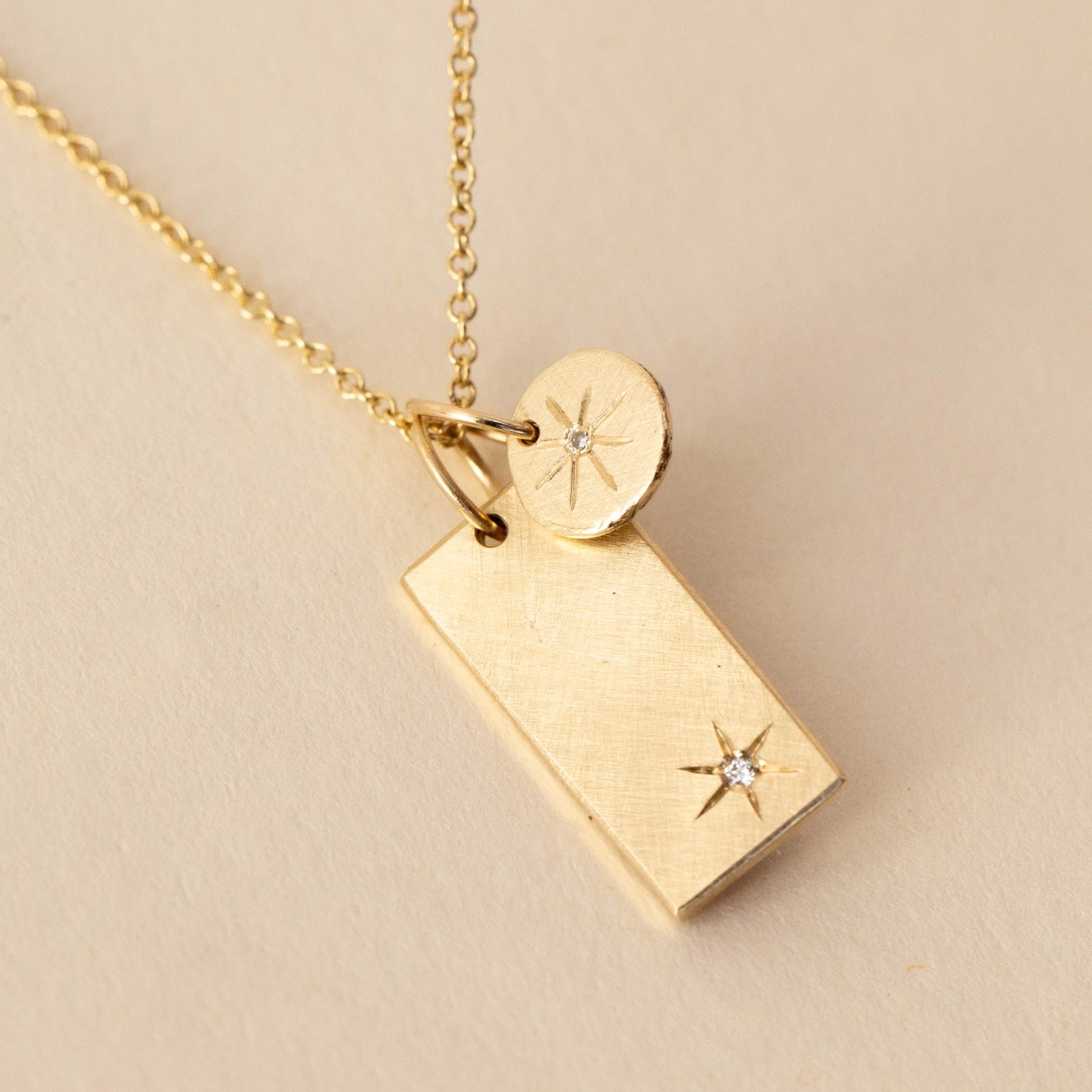 14k gold GIKS bar with GORU charm